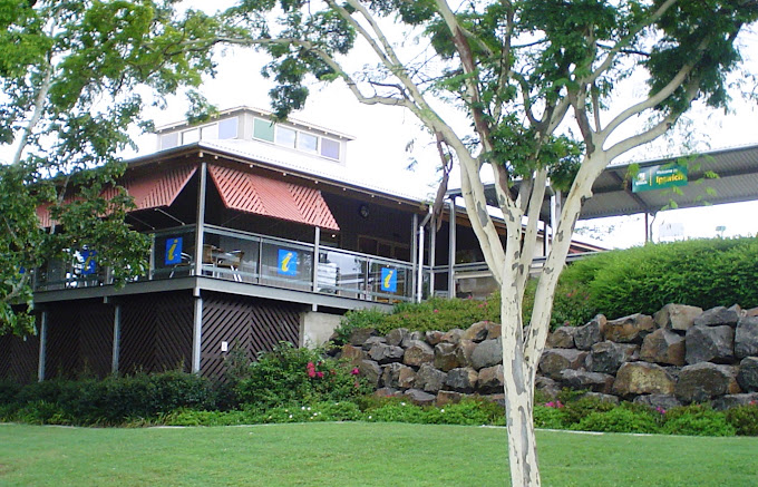 Ipswich Visitor Information Centre building surrounded by gardens
