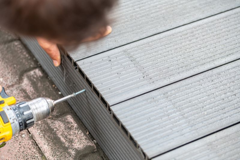 Finishing touches being applied to a newly installed composite deck