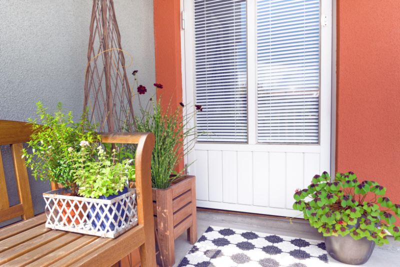 Verandah furnished with potted plants as an outdoor living space